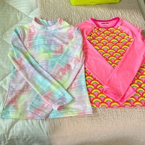 2 little girls swim shirts